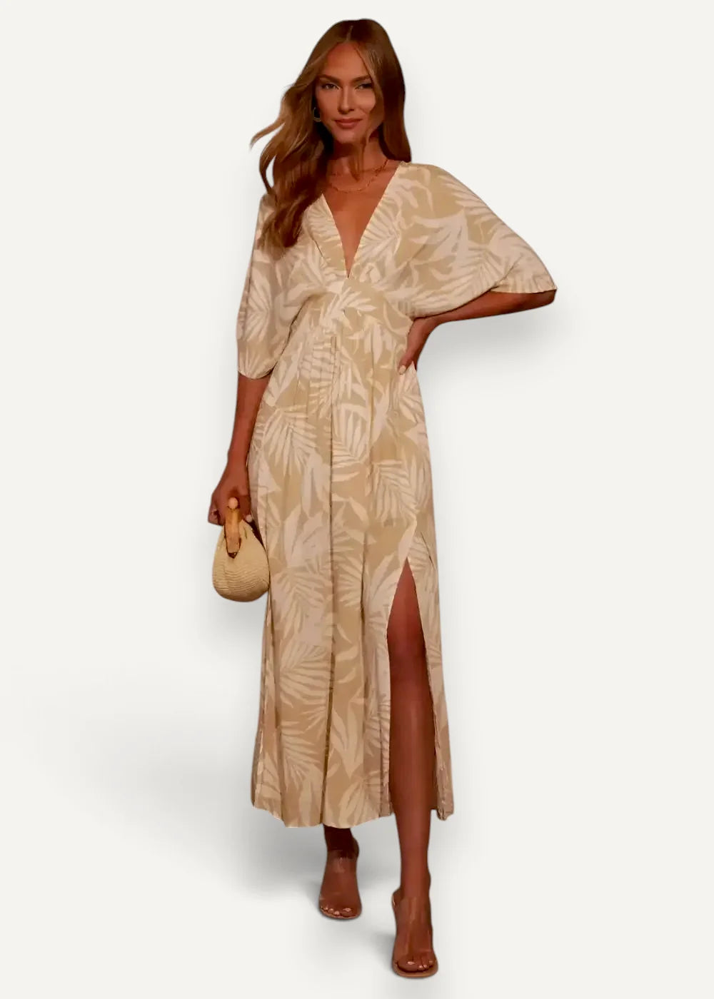 Beige palm leaf print kimono summer dress with v-neck wrap design and side slit for warm weather wear