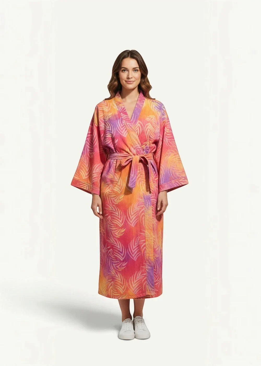 Kimono wrap dress maxi with long sleeves and tropical leaf pattern in vibrant orange pink and purple shades