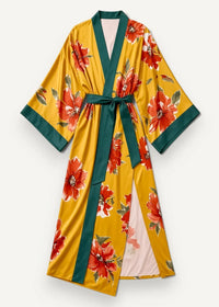 Long floral kimono duster in vibrant yellow with bold red flowers and dark green trim featuring a waist belt