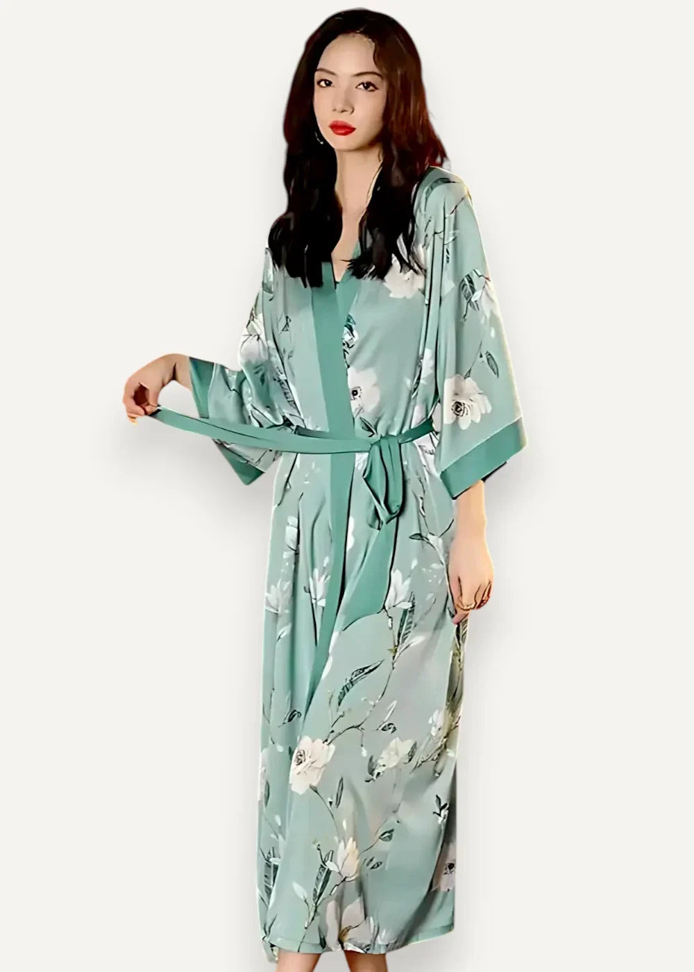 Long green satin robe featuring a flowing mint green fabric with a delicate white floral pattern and matching belt
