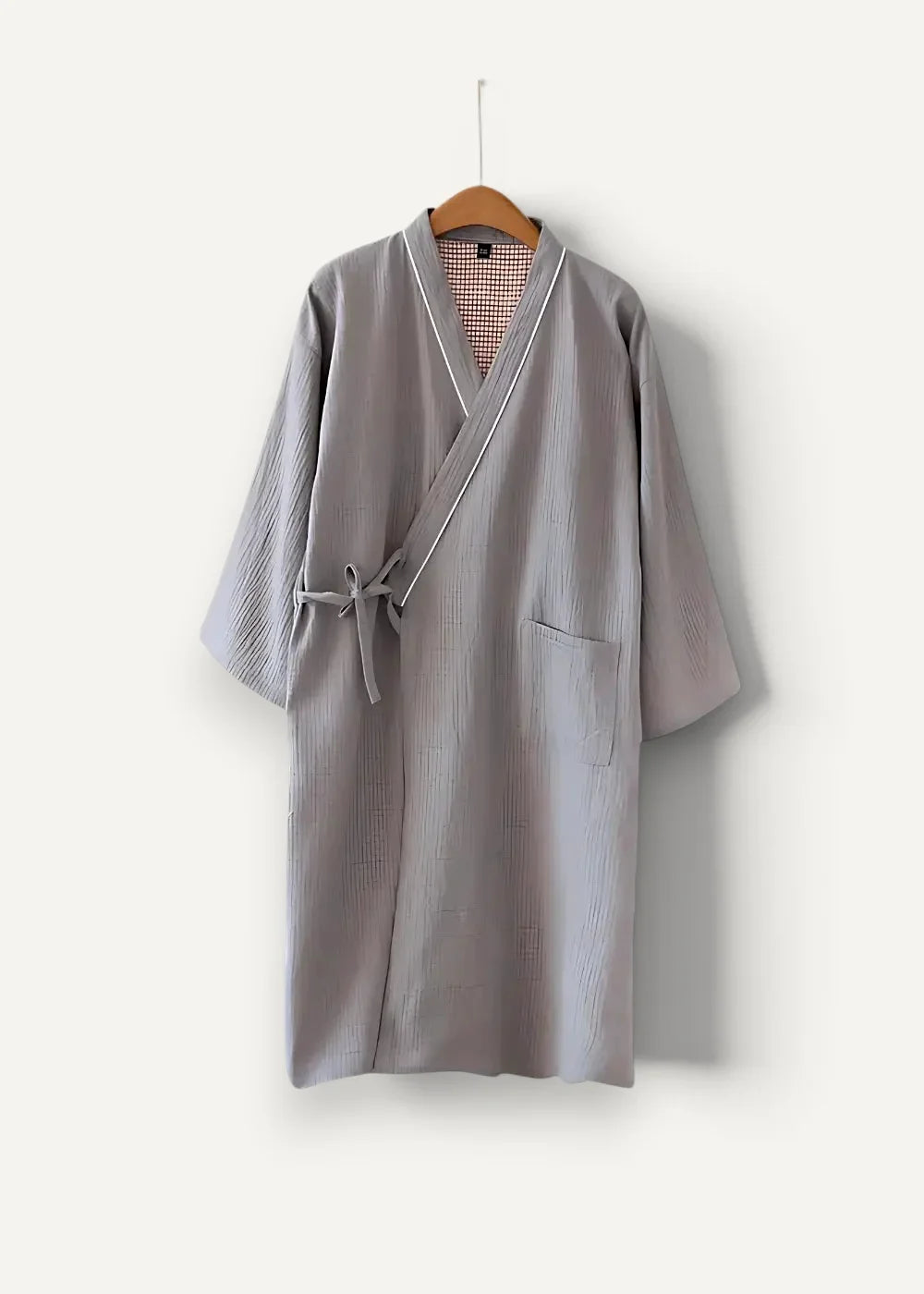 Long kimono bathrobe in gray striped cotton with white trim and checkered inner lining shown from the back side