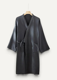 Long kimono style dressing gown in sleek black satin with subtle vertical pleats and matching tie belt