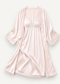 Long nightgown and robe set featuring a soft blush pink satin robe with lace trim and flowing silhouette