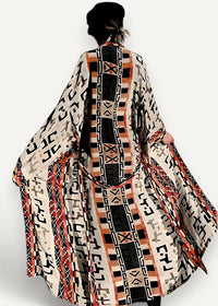 Long open front kimono flowing cream coat with bold black and terracotta geometric patterns and long sleeves