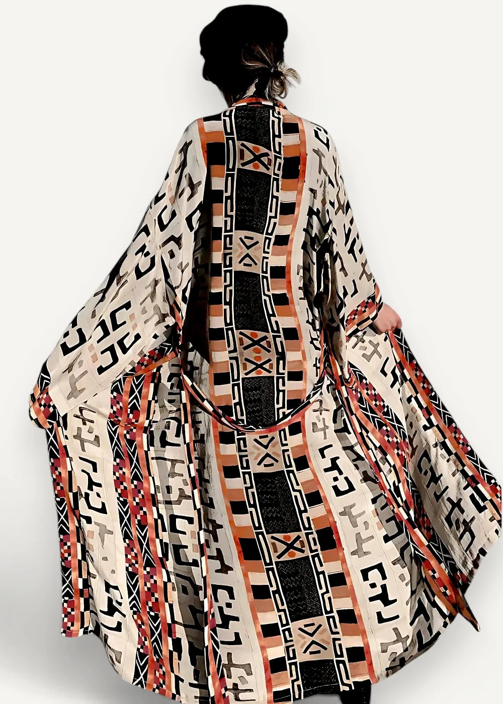 Long open front kimono flowing cream coat with bold black and terracotta geometric patterns and long sleeves