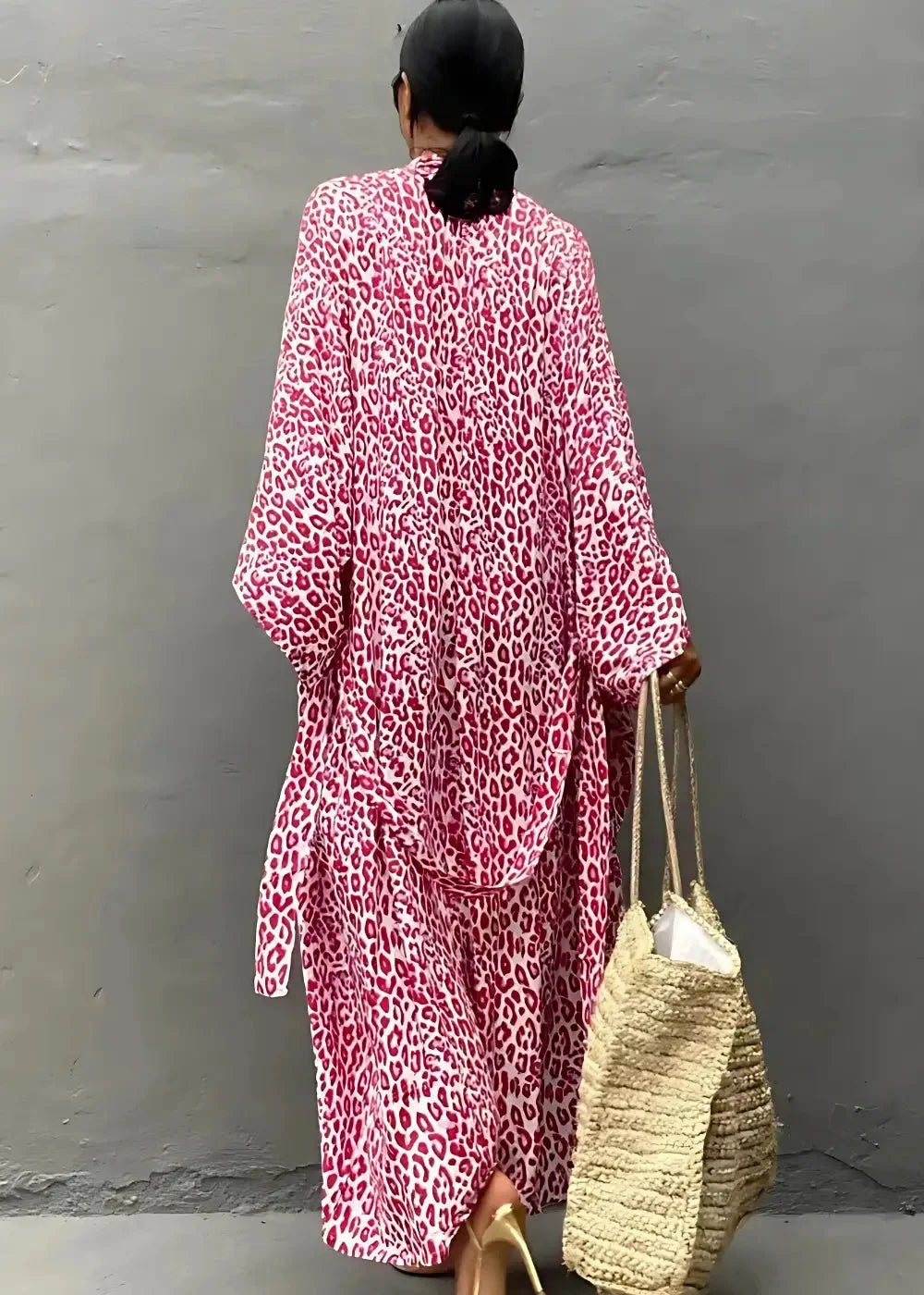 Long pink kimono flowing pink and white leopard print kaftan dress with wide sleeves and lightweight fabric