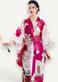 Long pink satin robe in vibrant magenta and white silk with floral patterns pagoda motifs and gold trim