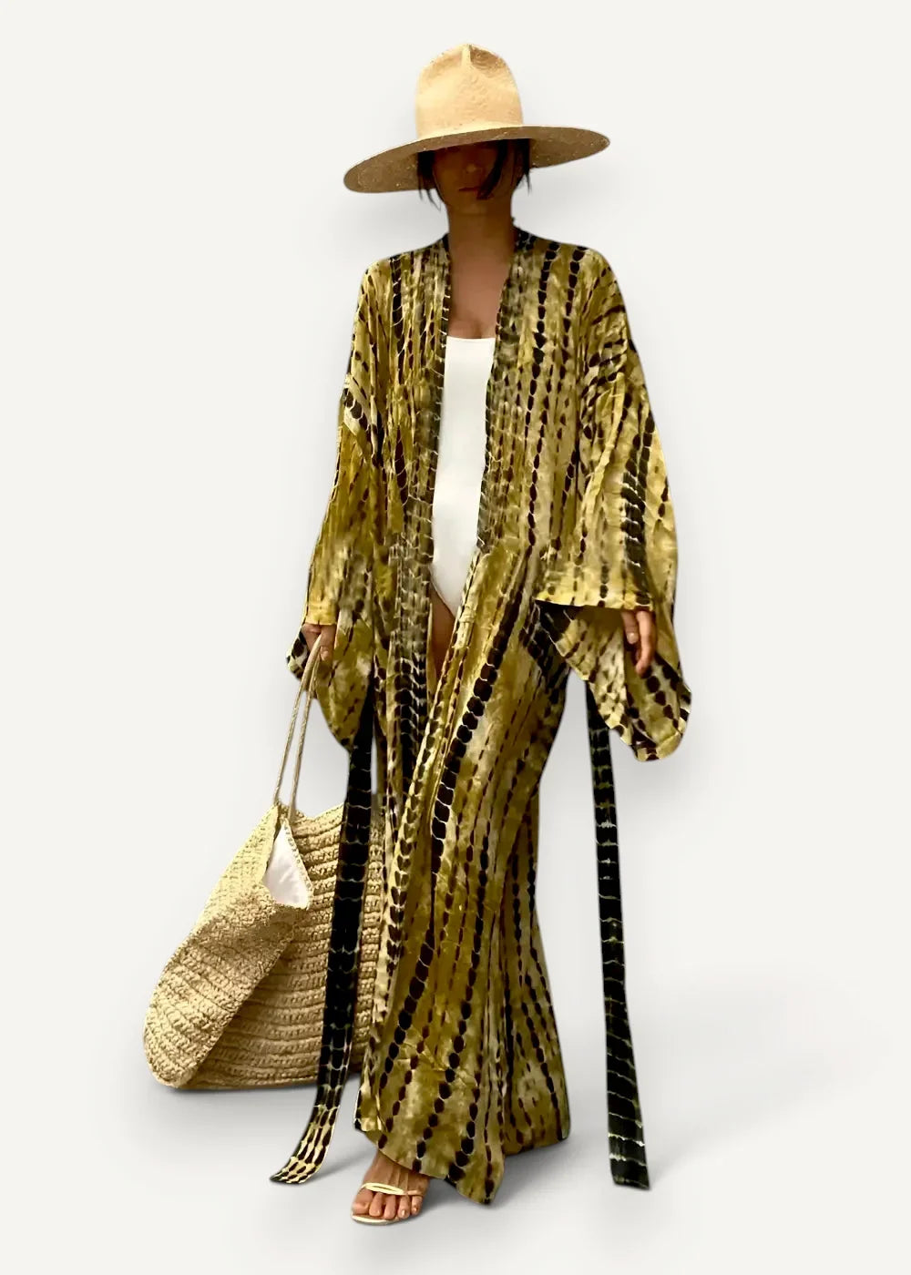 Maxi kimono beach cover up in flowing gold and black tie-dye velvet with long sleeves and a wide belt