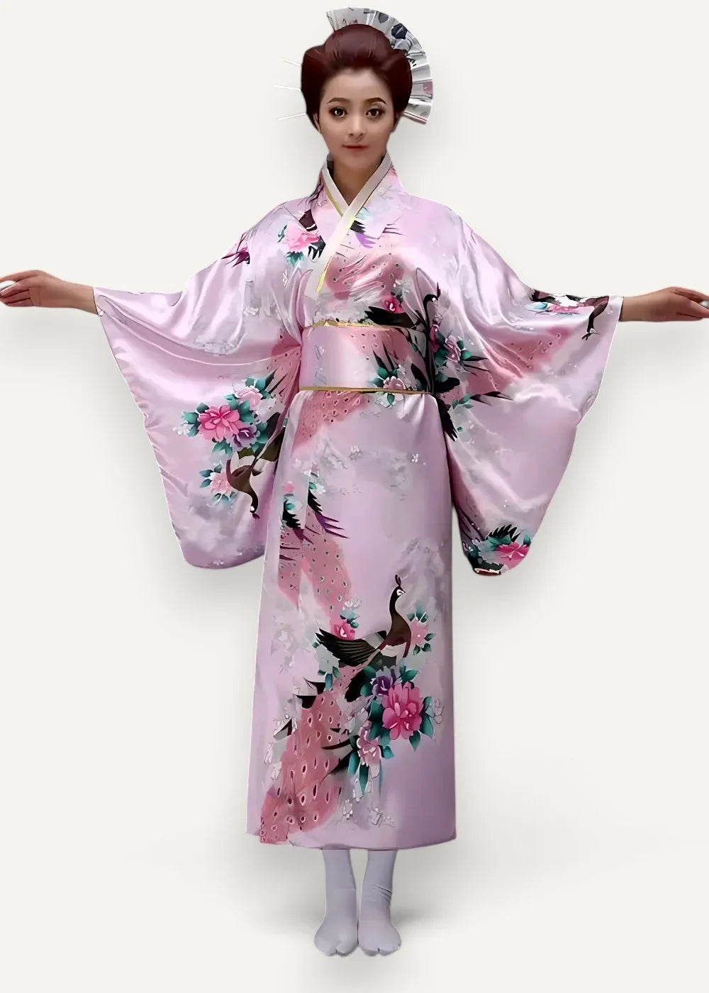 Maxi satin robe featuring a shimmering light pink silk kimono with black and vibrant fuchsia peacock floral motifs and gold obi belt