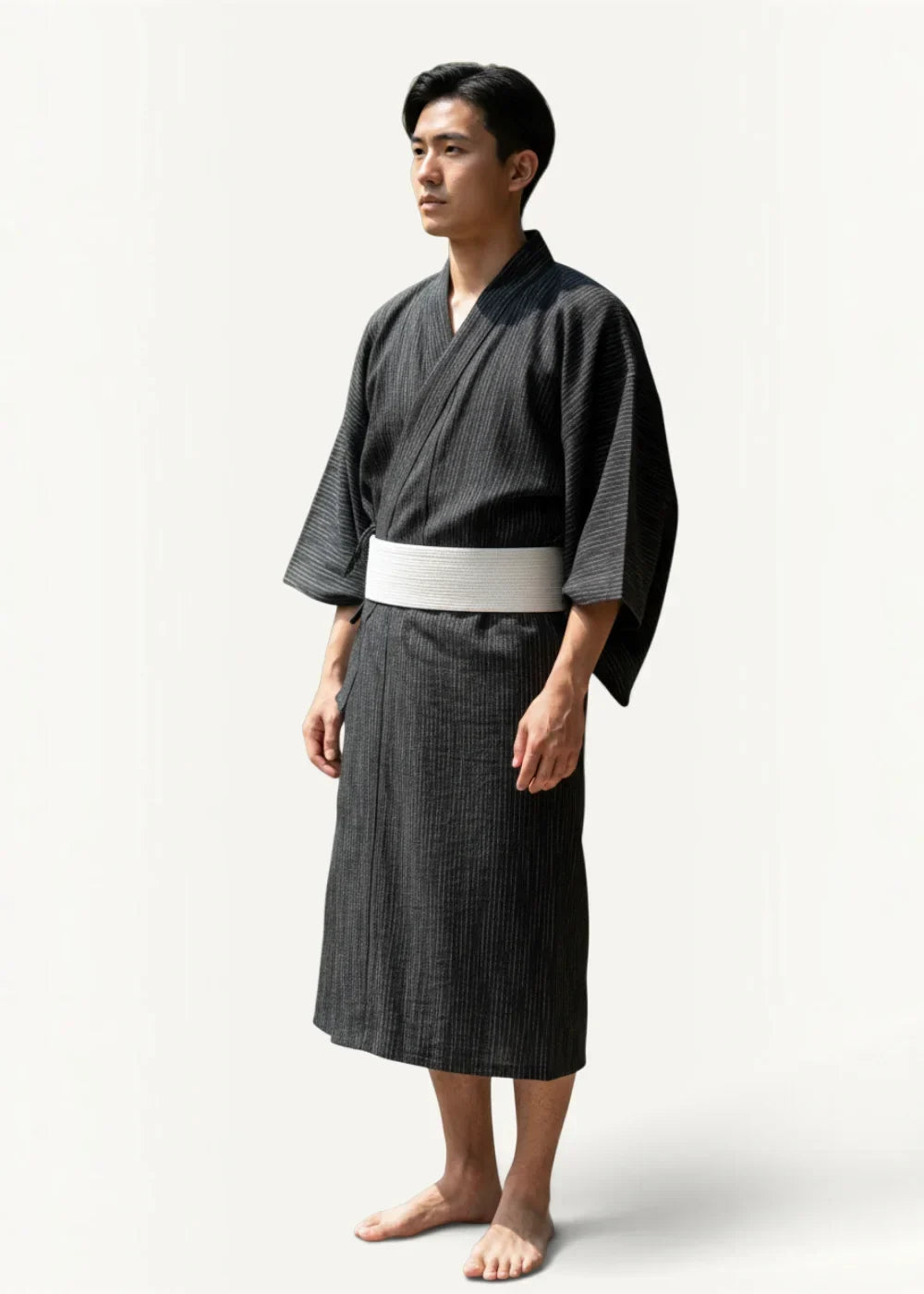 Men’s black kimono with black stripes and a crisp white obi belt shown from the front