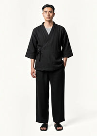 Black cotton men's kimono pajamas with a v neck, three quarter sleeves and a tied waist for lounging