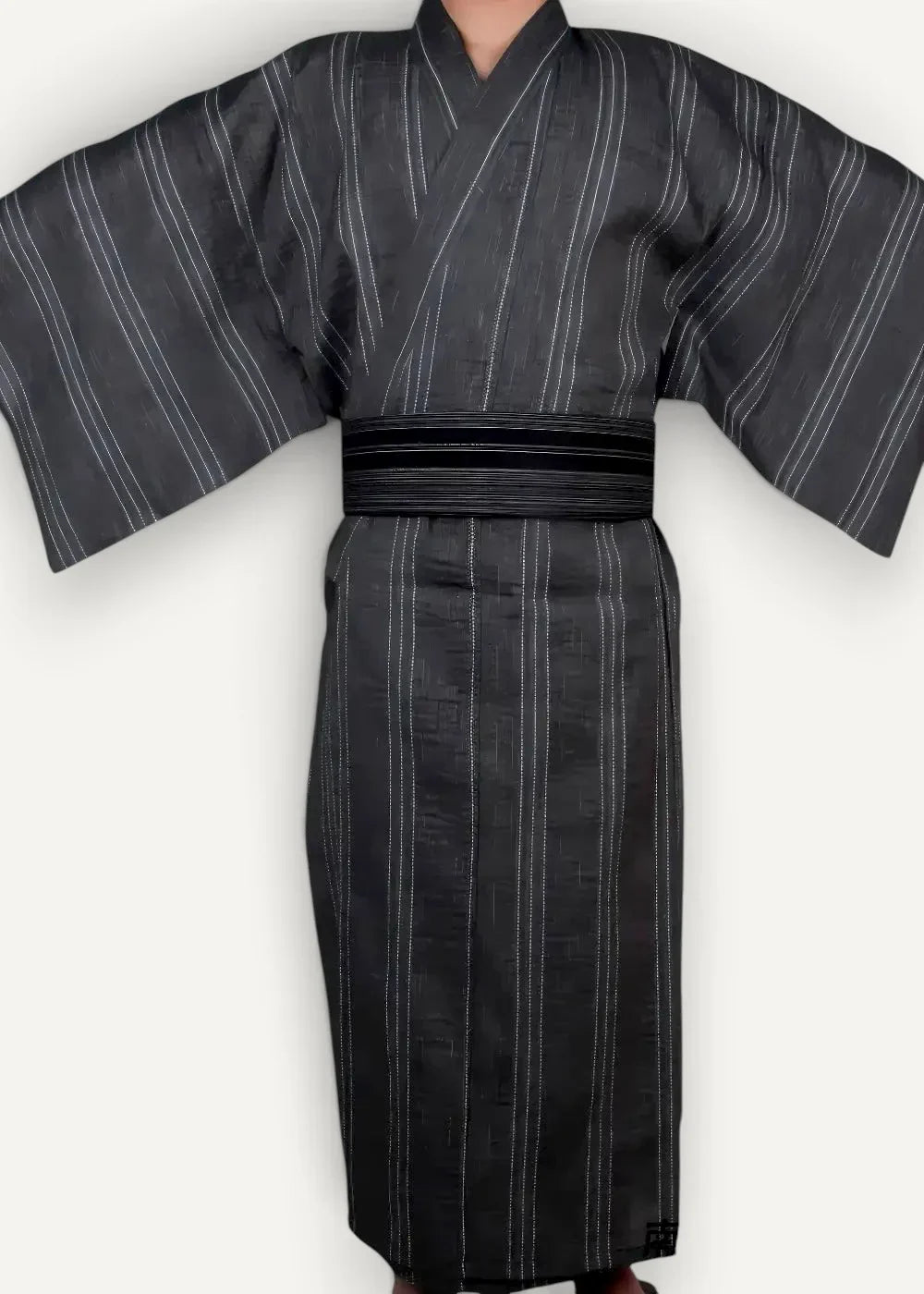 Men’s kimono traditional in black with fine white vertical stripes and matching black obi belt shown from the back