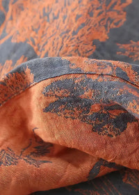 Men’s silk kimono fabric with orange and dark blue textured woven pattern