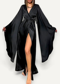 Black satin modern kimono dress with wide flowing sleeves and a high slit for elegant wear