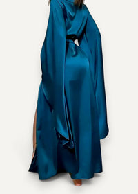 A flowing teal satin modern kimono dress with wide sleeves and a high slit perfect for elegant occasions