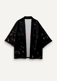 Black kimono-style jacket for men with a repeating pattern of stylized red and white eyes
