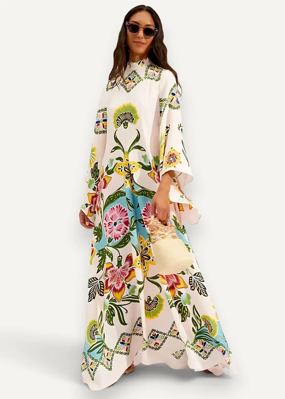 Modern kimono style dress off-white flowing maxi with vibrant floral patterns and embroidered neckline and hem details