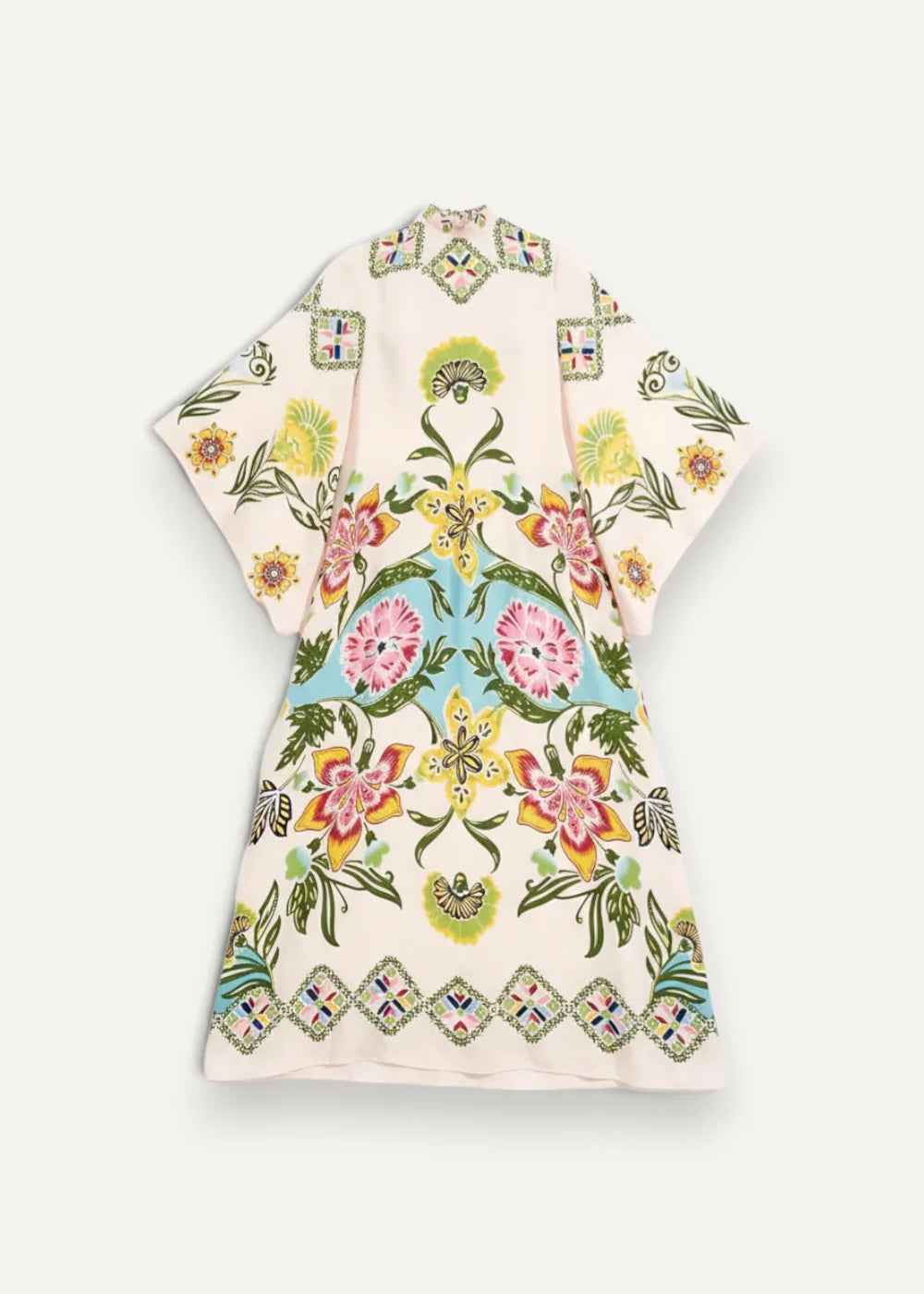 Modern kimono style dress in cream fabric with vibrant pink yellow green floral patterns and geometric accents
