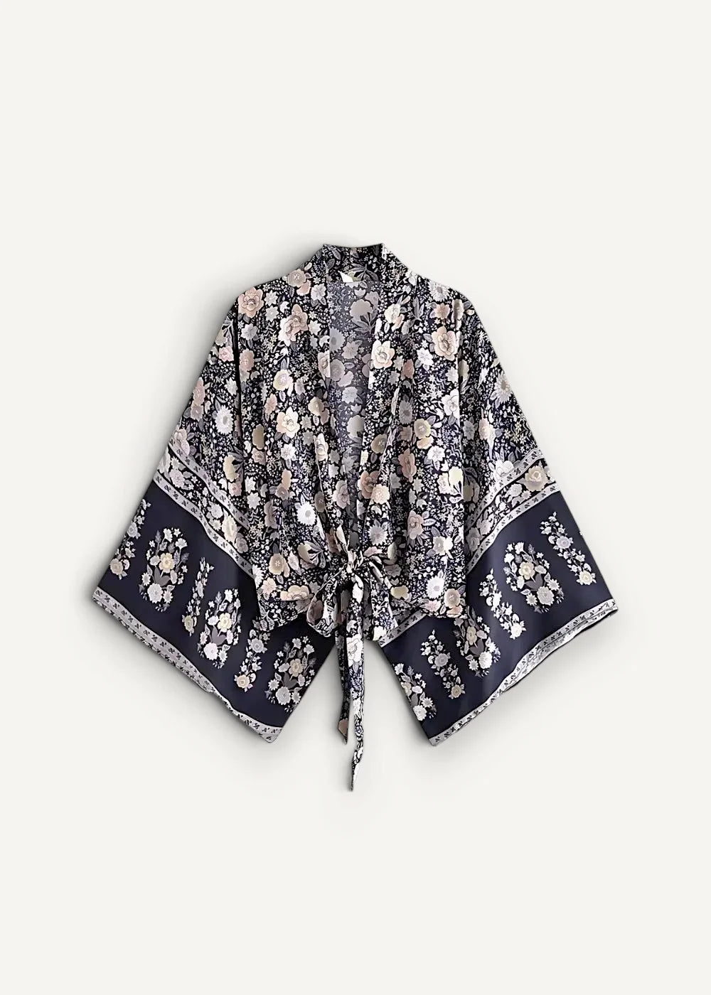 Navy blue kimono cover up with flowing black and white floral print wide sleeves tied at the front
