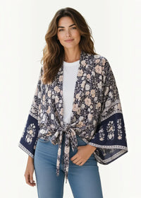 Navy blue kimono cover up with cream floral print wide sleeves and waist tie in lightweight fabric
