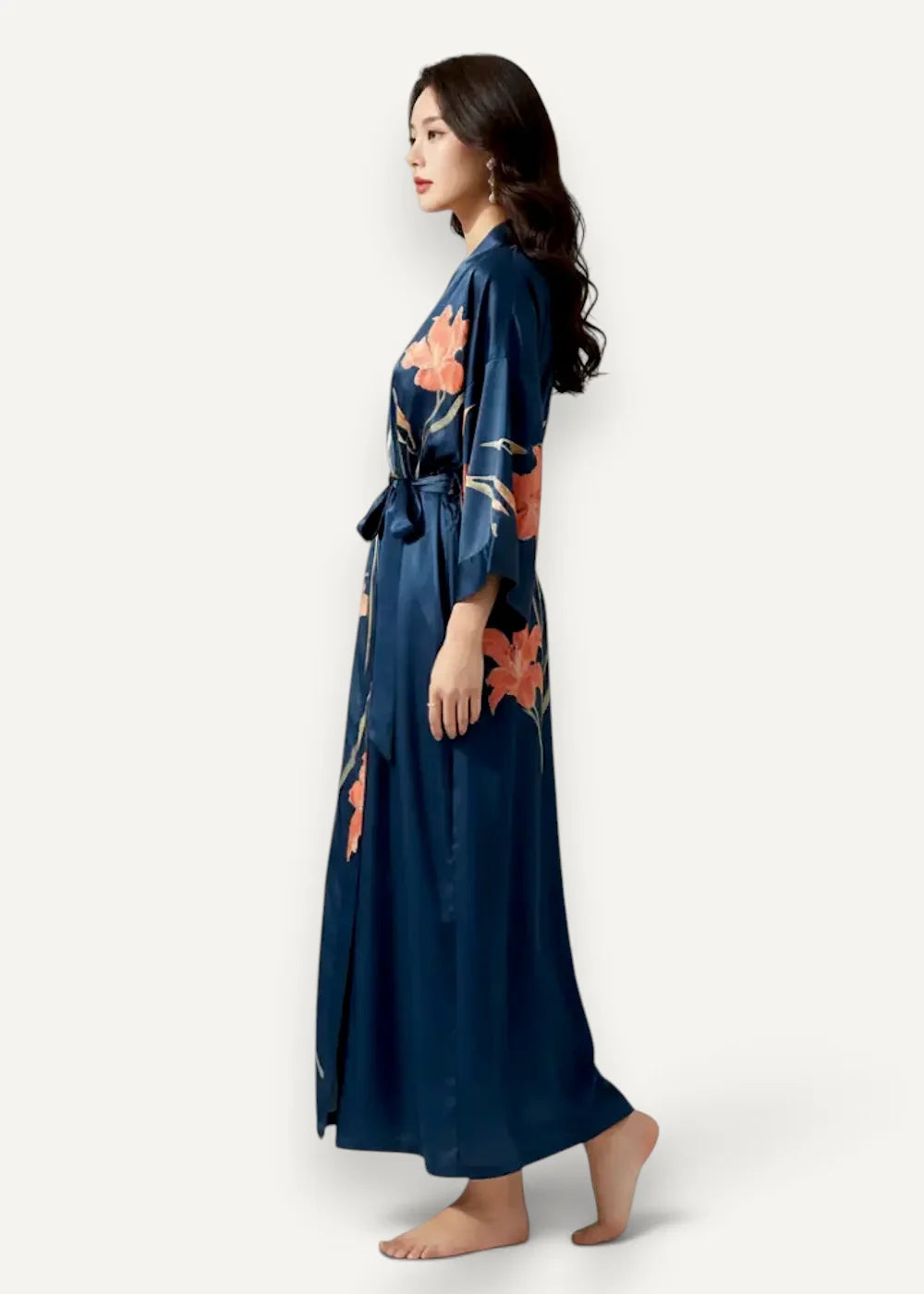 Navy blue satin robe with vibrant orange floral patterns and a matching belt for elegant loungewear