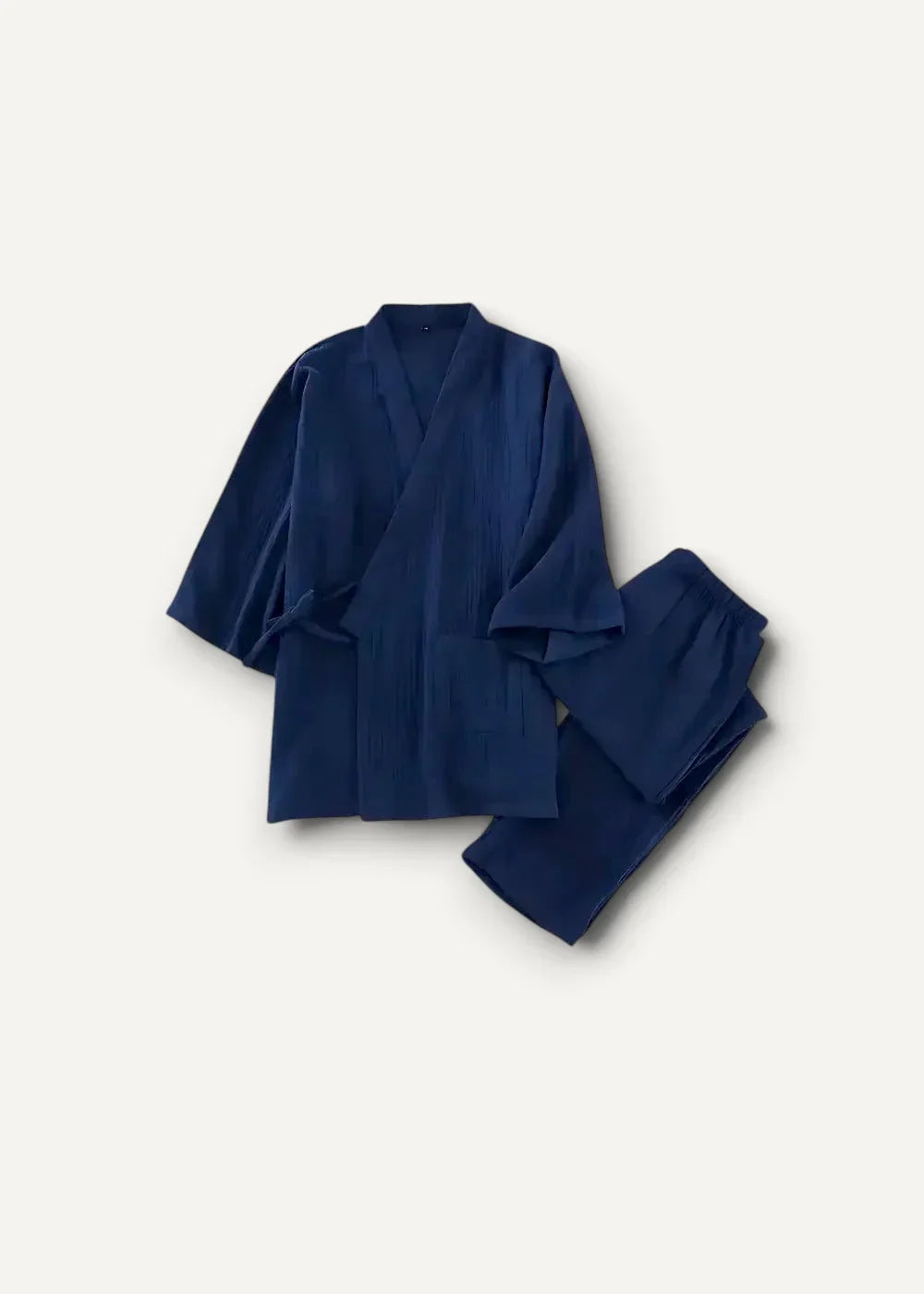 Deep navy blue traditional japanese cotton kimono pajamas with soft flowing fabric and classic obi style wrap