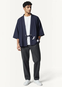 Navy haori jacket featuring navy blue fabric with white bird embroidery and a tied belt detail