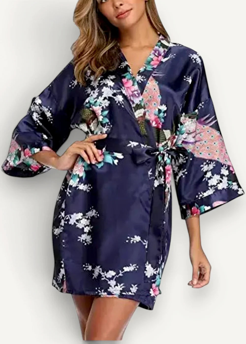 Navy satin robe with a floral pattern of pink white and green blossoms and a matching tie belt