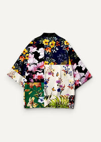 Patchwork kimono jacket with vibrant bold floral and botanical prints in black cream green yellow pink orange and blue on lightweight fabric