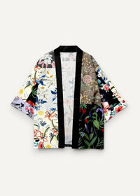 Patchwork kimono jacket with vibrant floral prints bold black trim on lightweight breathable fabric for layering