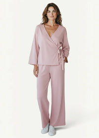 Pink kimono set featuring a soft blush pink wrap-style top with three-quarter sleeves and matching wide-leg trousers