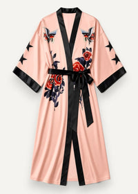 Pink satin kimono robe with black trim embroidered with red roses and tattoo style birds on the front