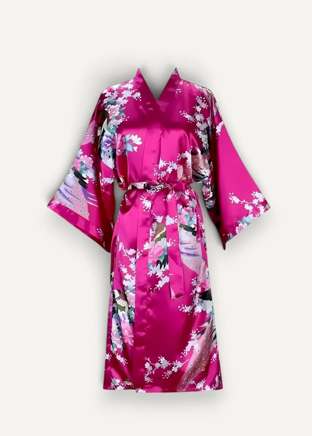 A vibrant fuchsia satin kimono robe with a delicate floral and bird pattern in soft pastel hues