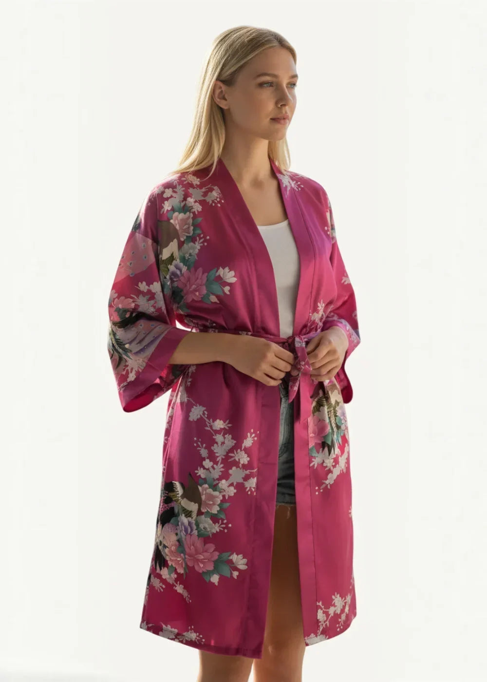 Pink satin robe in vibrant magenta silk with wide sleeves tied waist and floral bird pattern