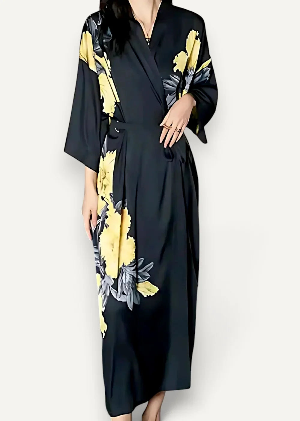 Plus size silk robe in black satin with vibrant yellow and gray floral pattern displayed from the front