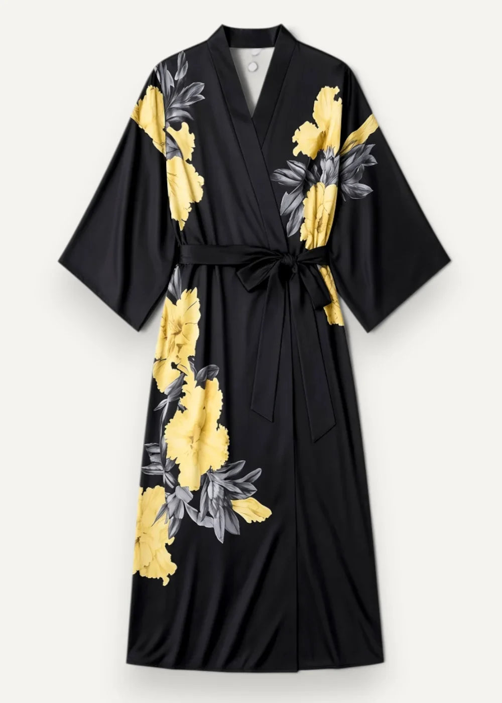 Plus size silk robe in black with vibrant yellow and gray floral pattern tied at the waist for a comfortable fit