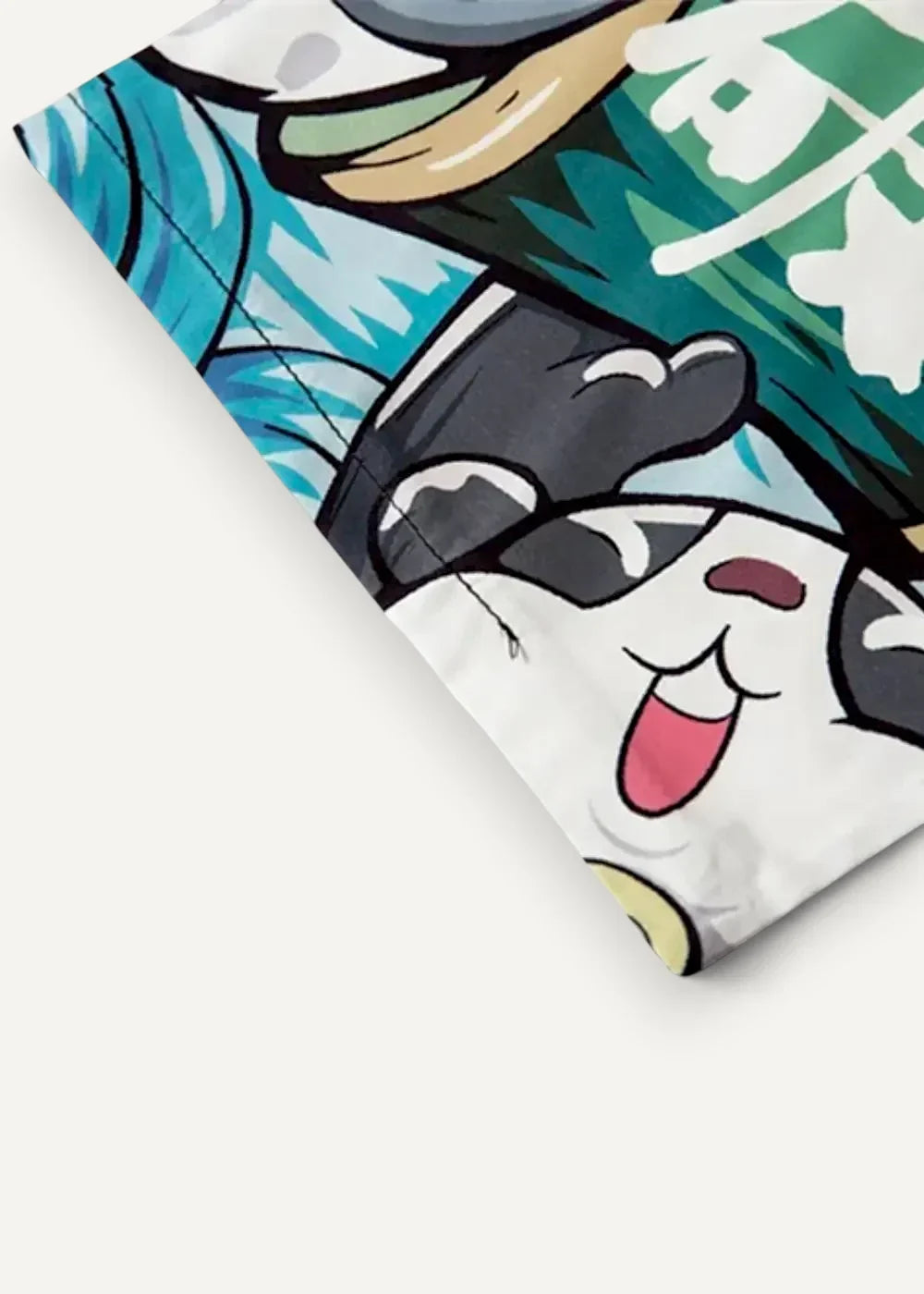 Printed kimono jacket in white fabric with vibrant cartoon panda, green foliage, and bold blue wave patterns