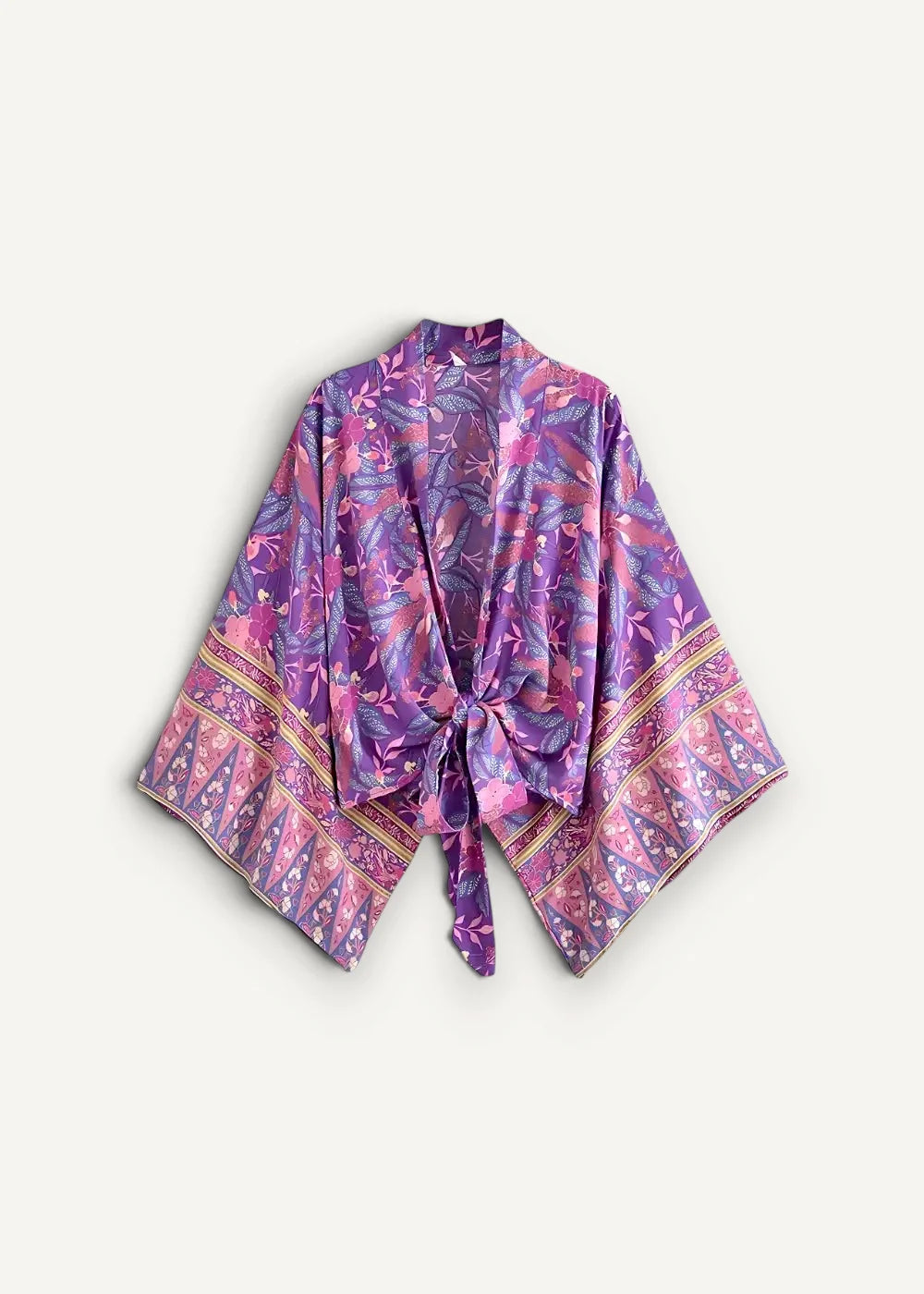 Purple kimono with a flowing pink and purple floral pattern and a tie-front design perfect for layering