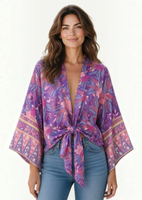 Purple kimono-style top with pink floral print wide sleeves and front tie detail for casual wear