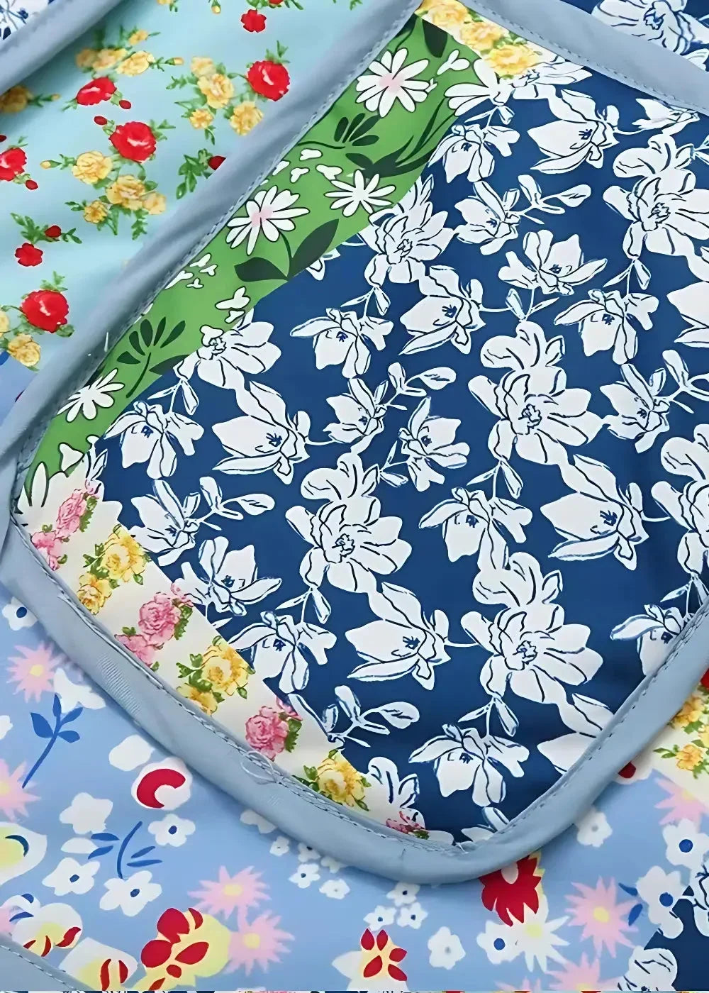 Quilted kimono jacket women’s with patchwork floral patterns in blue green and light blue fabrics featuring multicolor blossoms