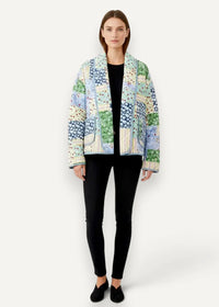Quilted kimono jacket womens patchwork design in soft pastel blues greens and creams with floral and dot patterns