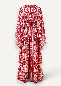 A flowing long-sleeved red and white kimono maxi dress with an intricate baroque-inspired floral print