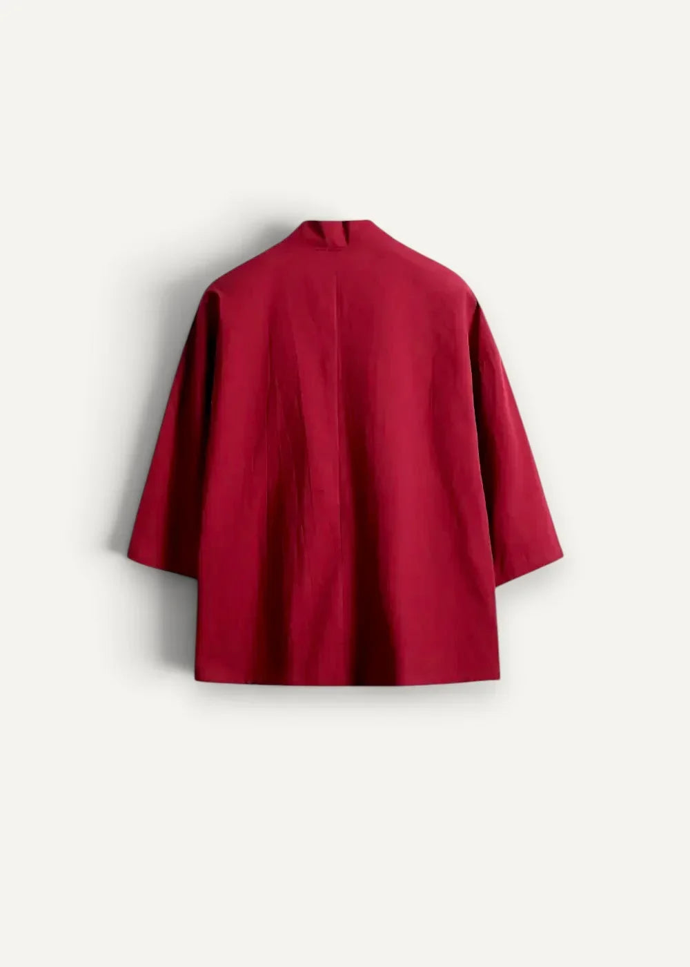 A sleek crimson red haori blazer with minimalist design and three quarter length sleeves for stylish wear