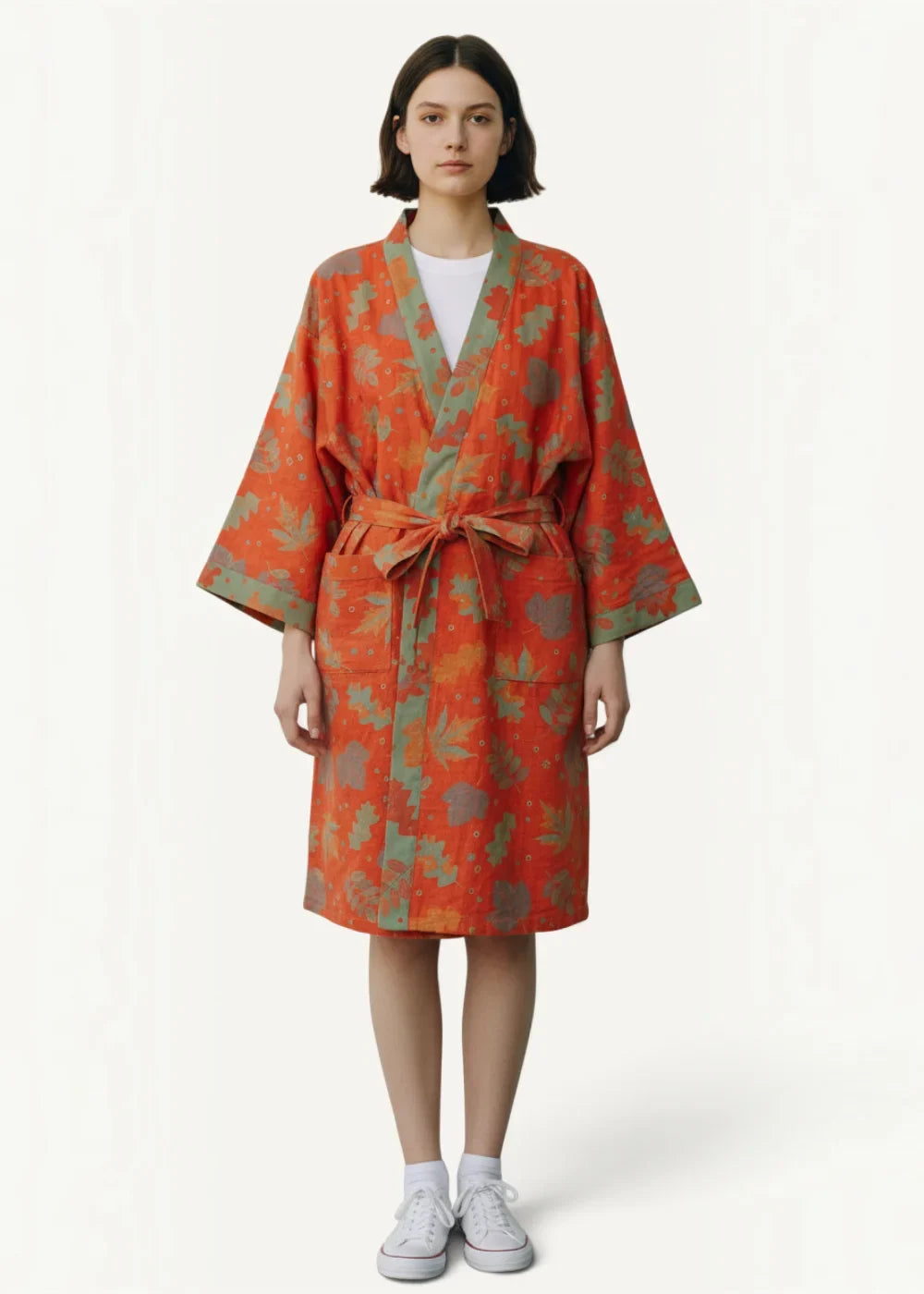 Orange kimono robe with leaf pattern and matching belt perfect for traditional Japanese wear