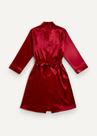 A red kimono robe made of rich crimson satin with a matching belt tied at the waist
