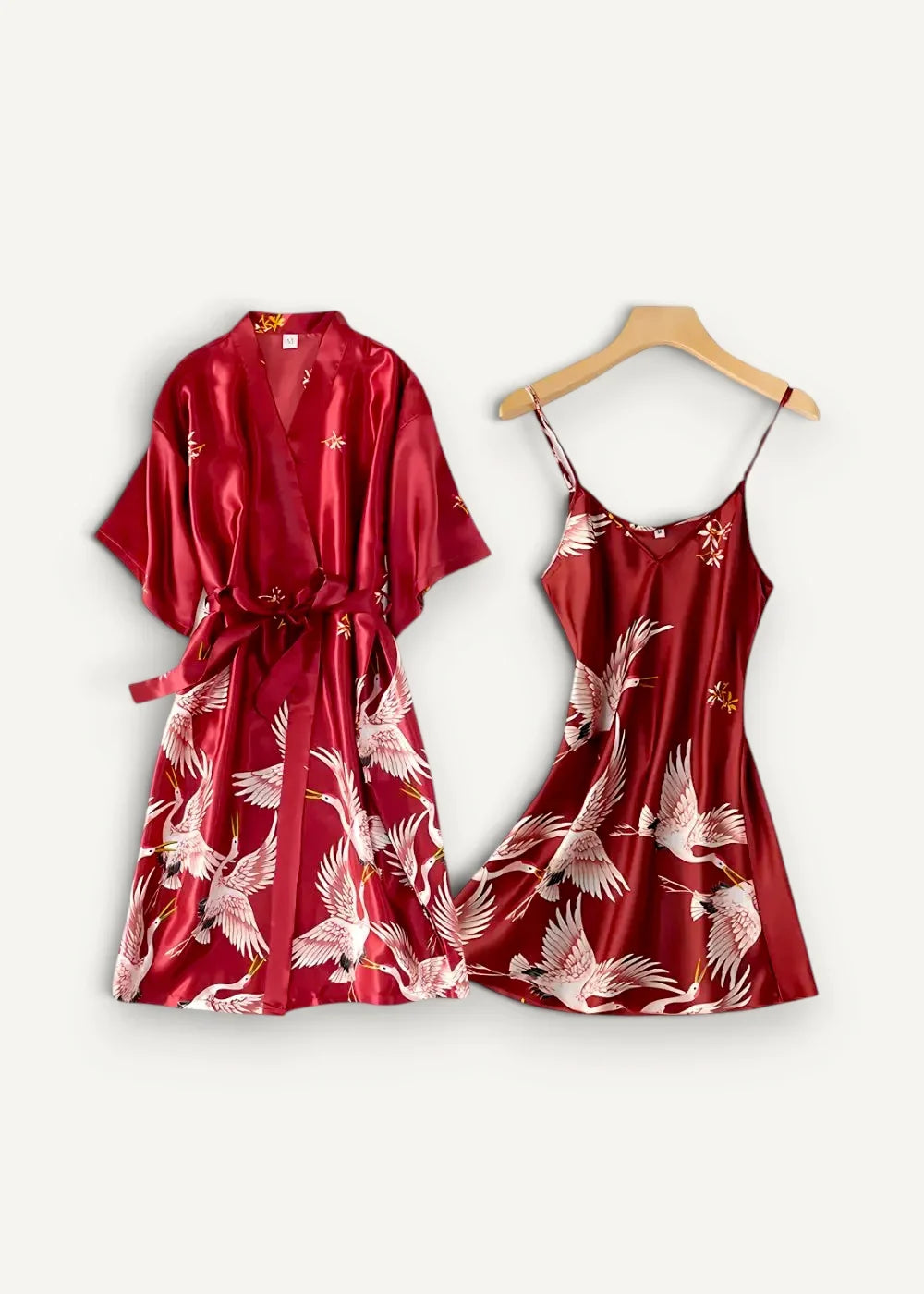 Red nightgown and robe set in red satin with a matching slip dress featuring a delicate white crane pattern