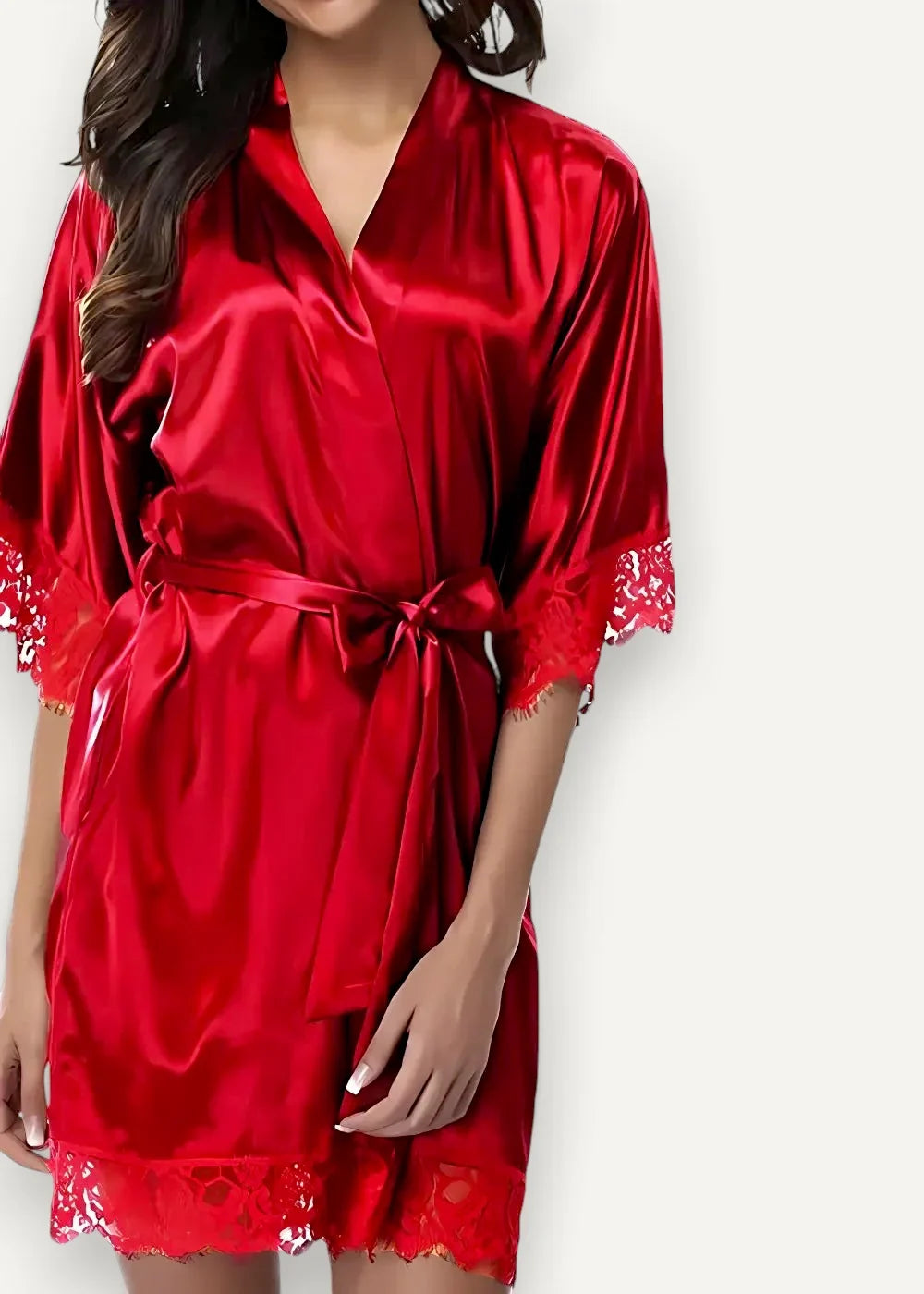 A vibrant red satin and lace robe featuring delicate lace trim at cuffs and hem with a matching satin belt