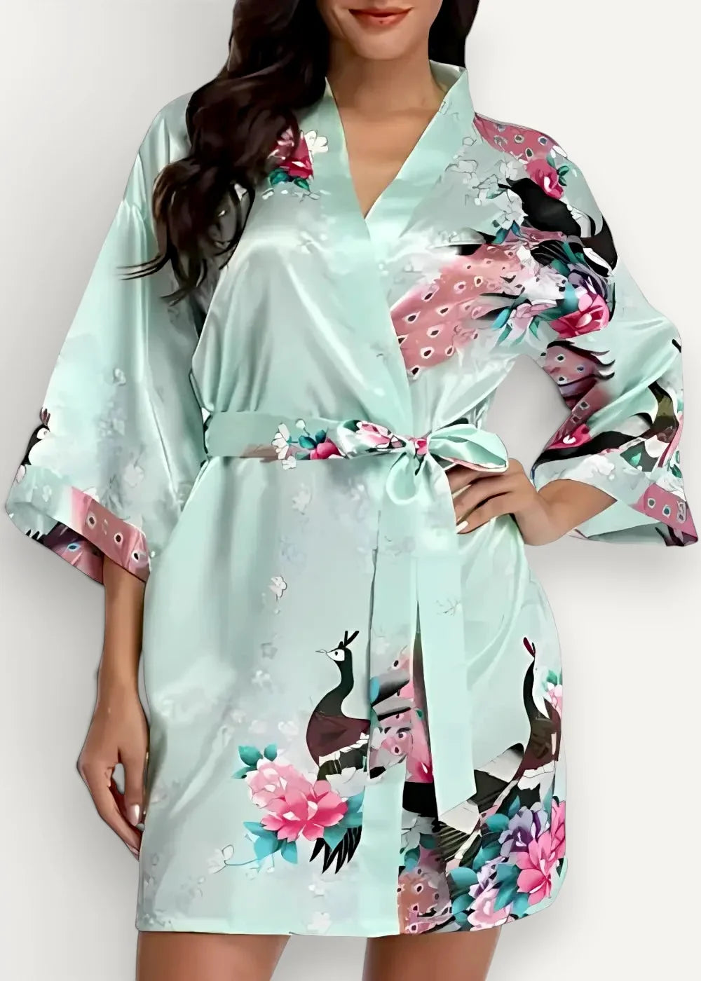A light mint green satin kimono robe short featuring a vibrant peacock and floral pattern with pink black and teal accents
