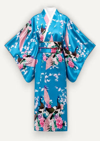 A vibrant blue satin kimono with pink peonies black and white birds wide sleeves and a matching belt