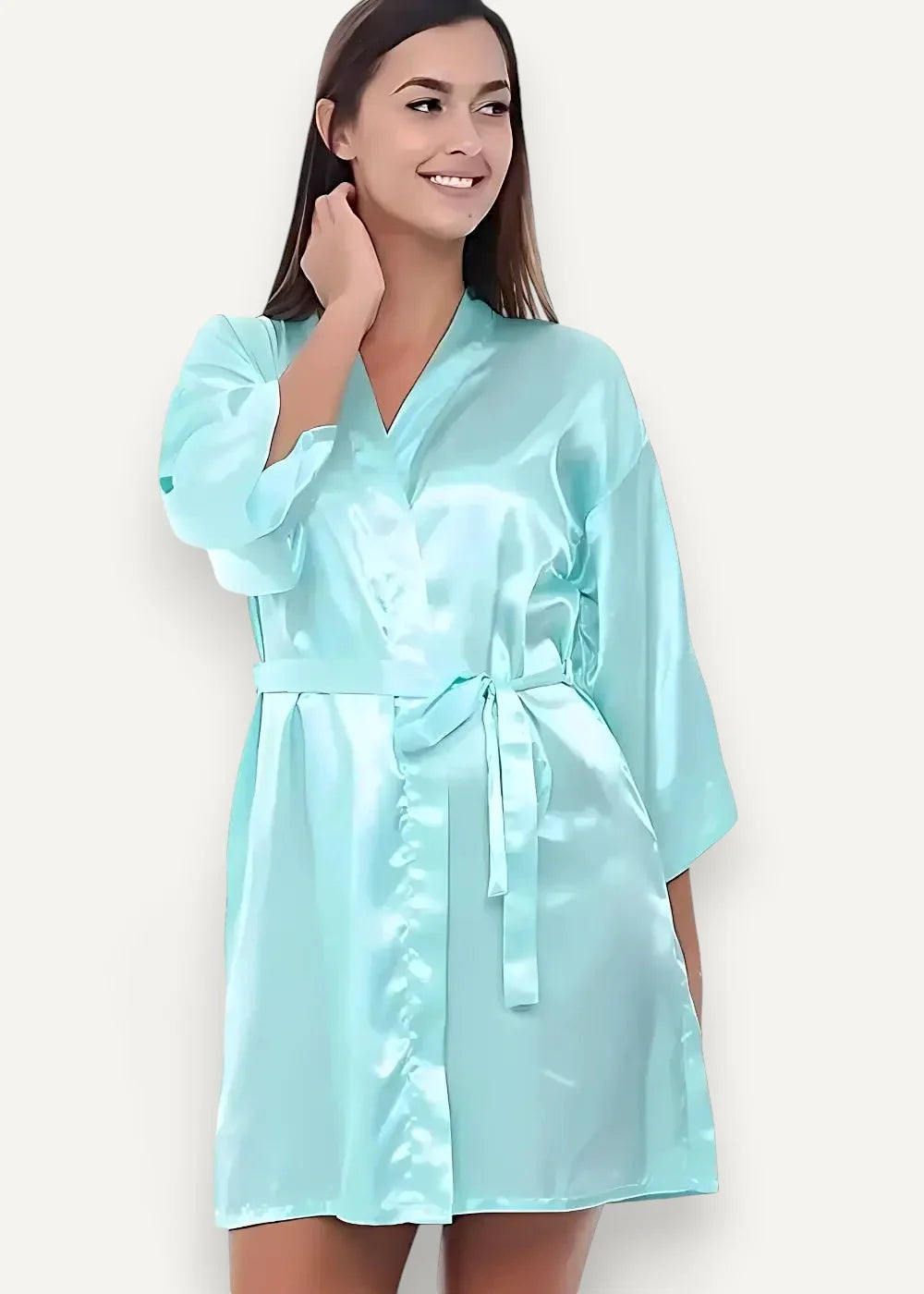 A light blue satin robe for women with v-neckline three quarter sleeves and a matching waist belt
